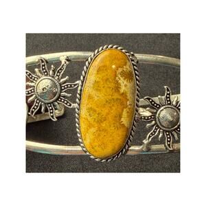 Southwestern-style sterling silver 925 cuff bracelet Agitated Coral with suns